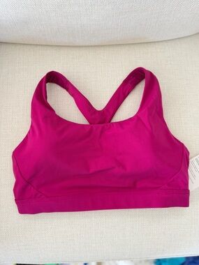 ATHLETA PINK ULTIMATE BRA IN SUPERSONIC size M NWT
